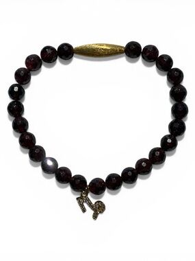 Faceted Garnet Bead Stretch Bracelet with Gold Accent and Zodiac Charm